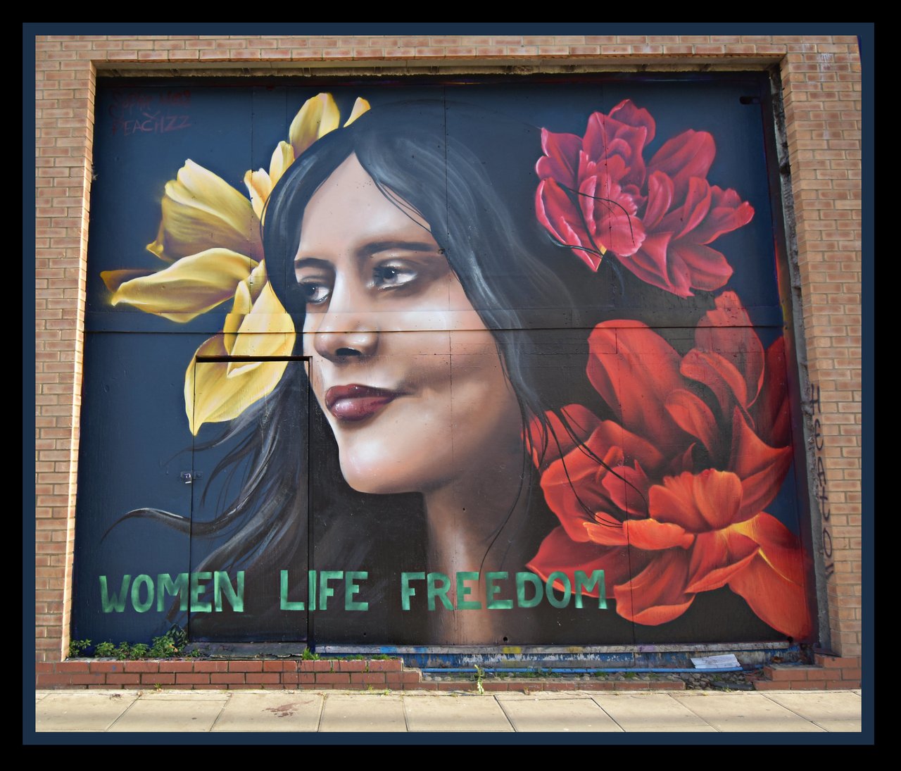 Mahsa Amini egy londoni falon - Fotó: flickr